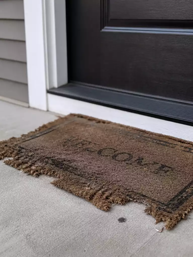 9. WORN DOORMAT